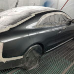 Audi A5 being resprayed in paint booth